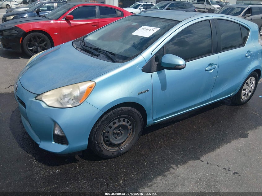 2014 Toyota Prius c VIN JTDKDTB36E1085885 IAAI salvage auction — NORMAL WEAR, Salvage Title, sold $375 on 2026-07-29 (photo 2)