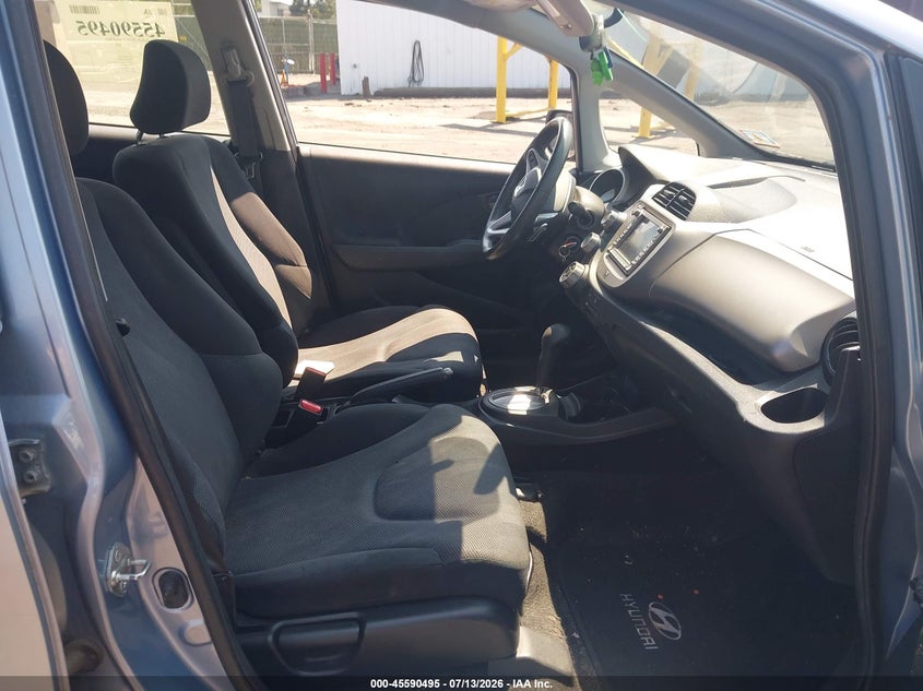 2011 Honda Fit VIN JHMGE8H65BC013091 IAAI salvage auction — NORMAL WEAR, Clear (Michigan), sold $1,800 on 2026-07-28 (photo 5)