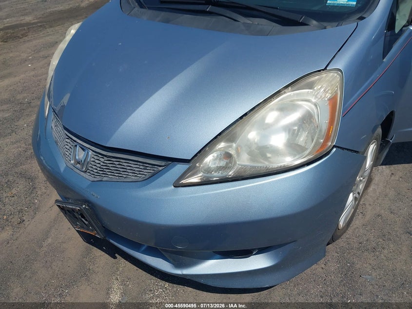 2011 Honda Fit VIN JHMGE8H65BC013091 IAAI salvage auction — NORMAL WEAR, Clear (Michigan), sold $1,800 on 2026-07-28 (photo 6)