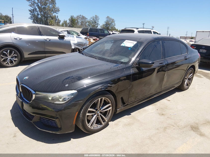 2017 BMW 7er VIN WBA7E2C55HG739285 IAAI salvage auction — LEFT SIDE, Salvage Title, sold $5,000 on 2026-08-12 (photo 2)