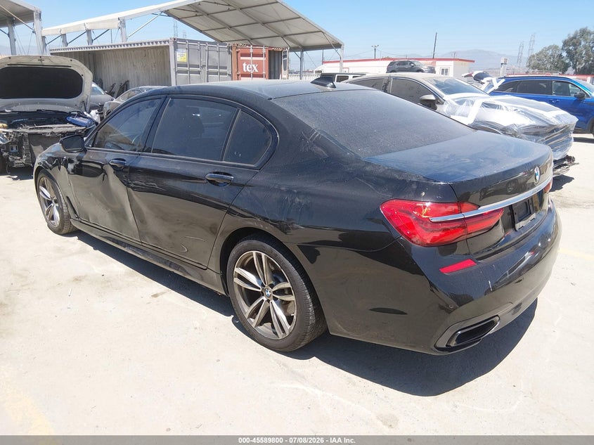 2017 BMW 7er VIN WBA7E2C55HG739285 IAAI salvage auction — LEFT SIDE, Salvage Title, sold $5,000 on 2026-08-12 (photo 3)