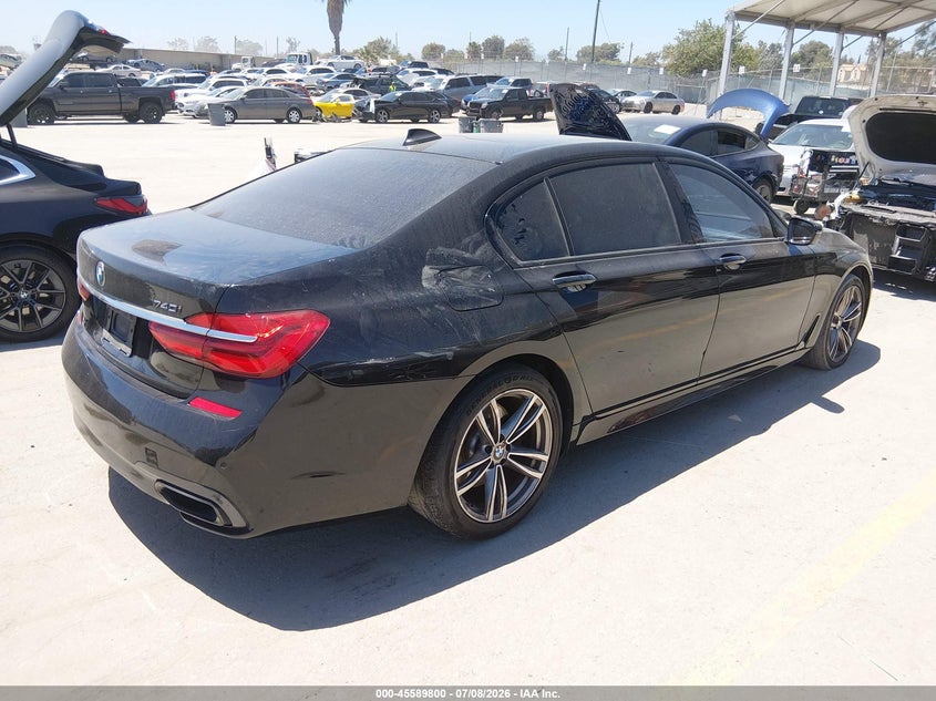 2017 BMW 7er VIN WBA7E2C55HG739285 IAAI salvage auction — LEFT SIDE, Salvage Title, sold $5,000 on 2026-08-12 (photo 4)