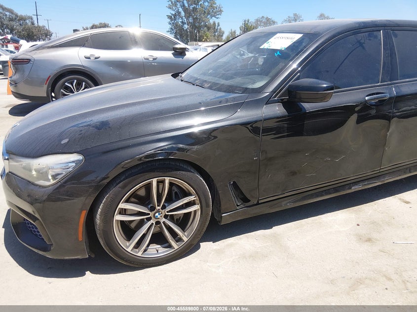 2017 BMW 7er VIN WBA7E2C55HG739285 IAAI salvage auction — LEFT SIDE, Salvage Title, sold $5,000 on 2026-08-12 (photo 6)