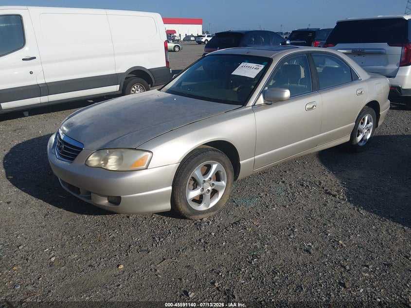 2002 Mazda Millenia VIN JM1TA221X21719037 IAAI salvage auction — NORMAL WEAR, Clear (Arkansas), sold $100 on 2026-07-29 (photo 2)