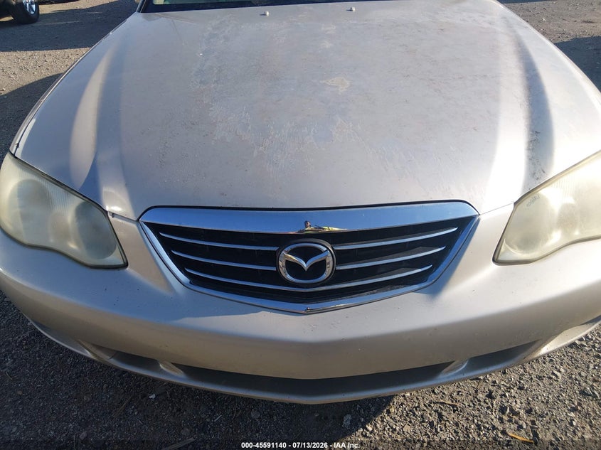 2002 Mazda Millenia VIN JM1TA221X21719037 IAAI salvage auction — NORMAL WEAR, Clear (Arkansas), sold $100 on 2026-07-29 (photo 6)