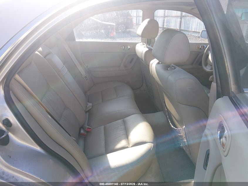 2002 Mazda Millenia VIN JM1TA221X21719037 IAAI salvage auction — NORMAL WEAR, Clear (Arkansas), sold $100 on 2026-07-29 (photo 8)