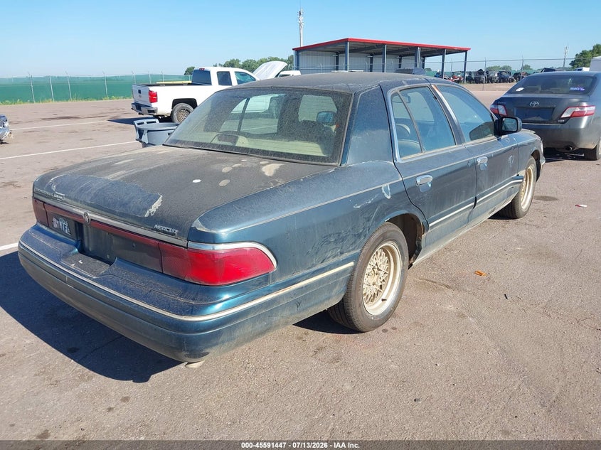 1997 Mercury Grand marquis VIN 2MELM75W6VX704881 IAAI salvage auction — NORMAL WEAR, Regular (South Dakota), sold $375 on 2026-07-28 (photo 4)