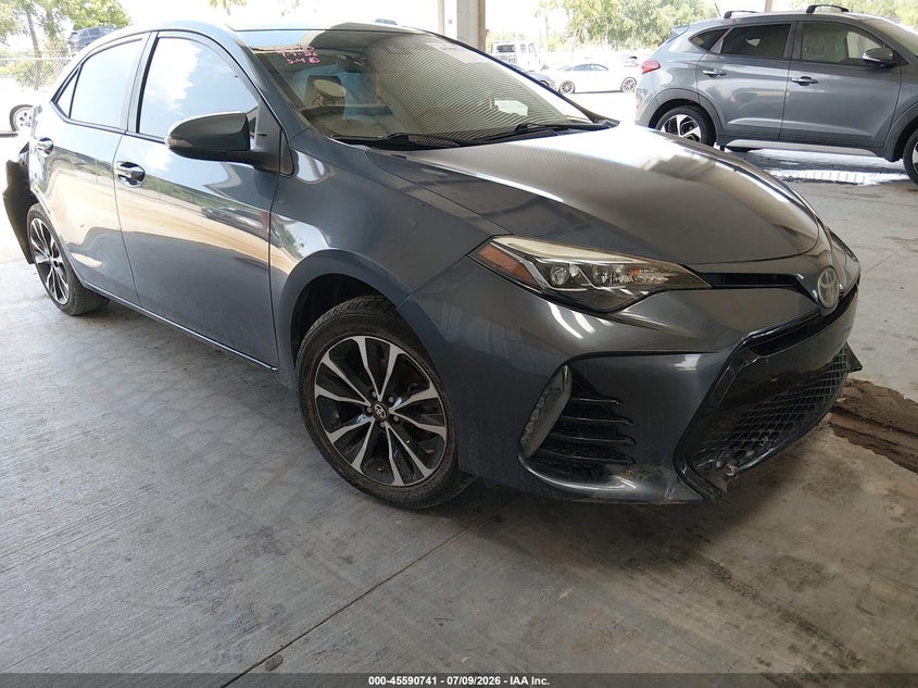 2018 Toyota Corolla VIN 5YFBURHE4JP797734 IAAI salvage auction — SIDE, Rebuildable (Florida), sold $2,500 on 2026-08-02 (photo 1)
