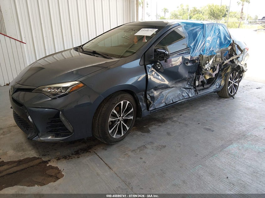 2018 Toyota Corolla VIN 5YFBURHE4JP797734 IAAI salvage auction — SIDE, Rebuildable (Florida), sold $2,500 on 2026-08-02 (photo 2)