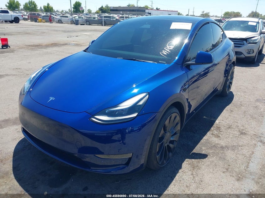 2025 Tesla Model y VIN 7SAYGDEF8SF232095 IAAI salvage auction — REAR END, Salvage Title, sold $15,950 on 2026-08-01 (photo 2)