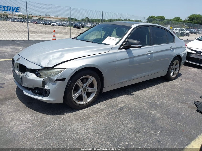 2015 BMW 3er VIN WBA3C3G50FNT52320 IAAI salvage auction — LEFT FRONT, Salvage Title, sold $1,400 on 2026-08-13 (photo 2)