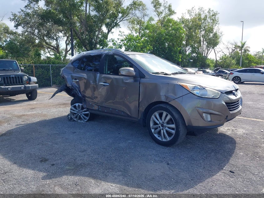 2011 Hyundai Tucson VIN KM8JU3AC7BU297701 IAAI salvage auction — REAR END, Rebuildable (Florida), sold $100 on 2026-07-29 (photo 1)