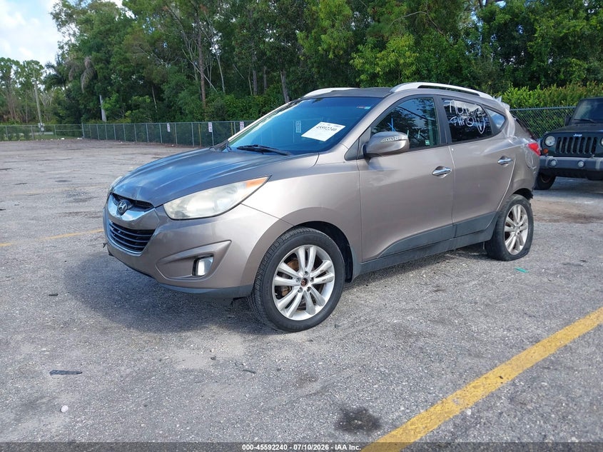2011 Hyundai Tucson VIN KM8JU3AC7BU297701 IAAI salvage auction — REAR END, Rebuildable (Florida), sold $100 on 2026-07-29 (photo 2)