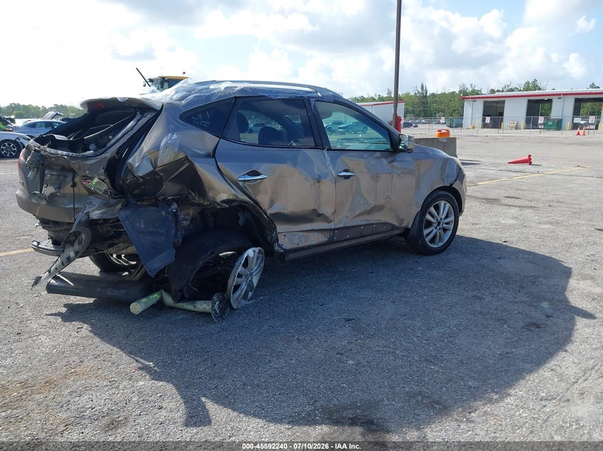 2011 Hyundai Tucson VIN KM8JU3AC7BU297701 IAAI salvage auction — REAR END, Rebuildable (Florida), sold $100 on 2026-07-29 (photo 4)