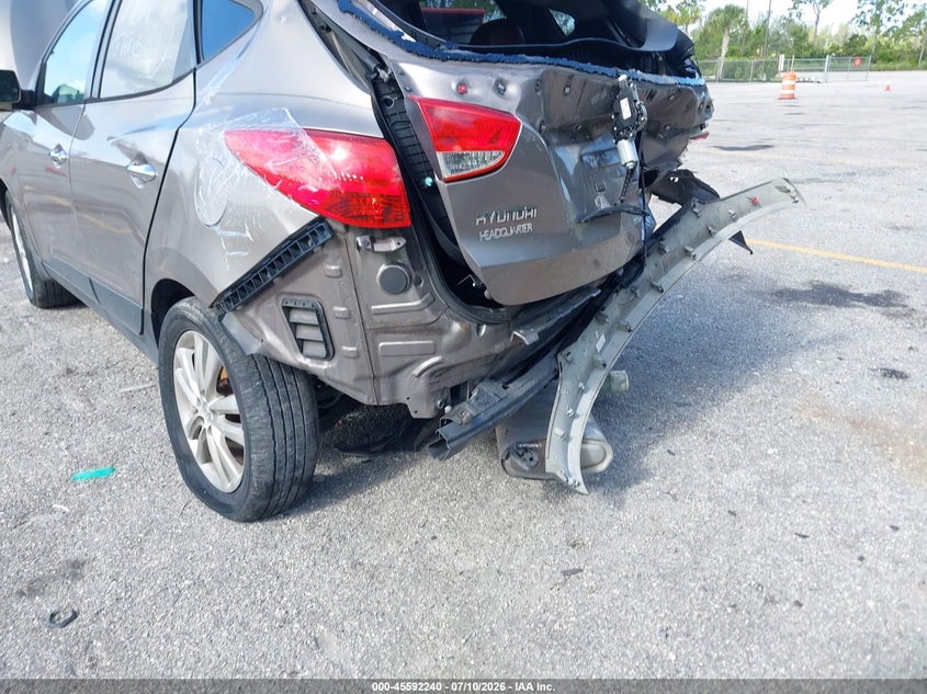 2011 Hyundai Tucson VIN KM8JU3AC7BU297701 IAAI salvage auction — REAR END, Rebuildable (Florida), sold $100 on 2026-07-29 (photo 6)
