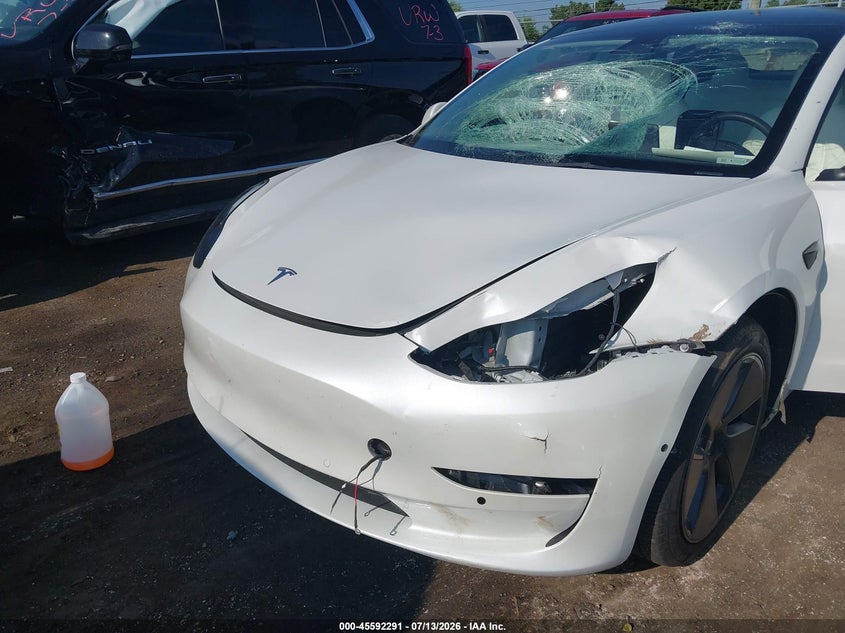 2022 Tesla Model 3 VIN 5YJ3E1EB9NF255091 IAAI salvage auction — LEFT FRONT, Clear (Michigan), sold $7,600 on 2026-07-31 (photo 6)
