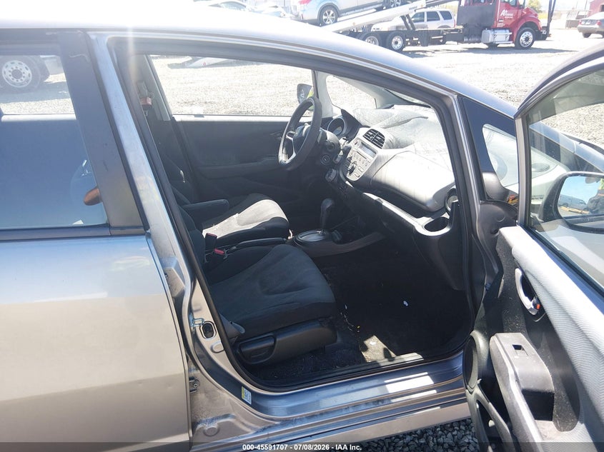 2009 Honda Fit VIN JHMGE88429C004034 IAAI salvage auction — NORMAL WEAR, Peddle Clear Public-Restricted (Oregon), sold $925 on 2026-07-27 (photo 5)