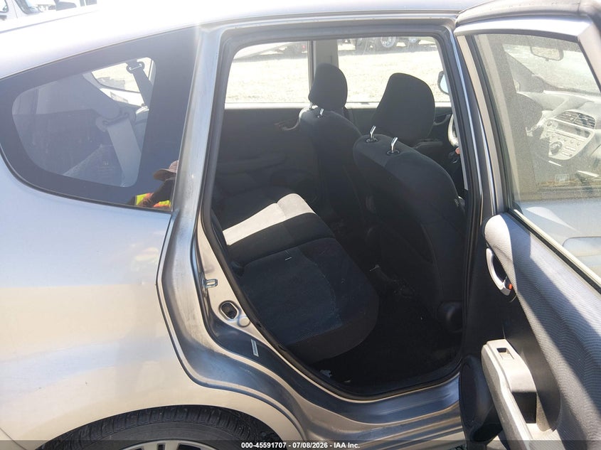2009 Honda Fit VIN JHMGE88429C004034 IAAI salvage auction — NORMAL WEAR, Peddle Clear Public-Restricted (Oregon), sold $925 on 2026-07-27 (photo 8)