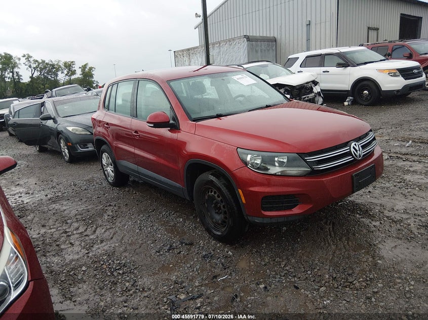 2014 Volkswagen Tiguan VIN WVGCV3AX7EW086838 IAAI salvage auction — NORMAL WEAR, Wait Title, sold $1,100 on 2026-08-13 (photo 1)