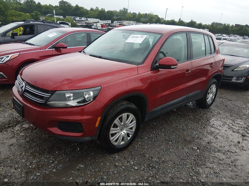 2014 Volkswagen Tiguan VIN WVGCV3AX7EW086838 IAAI salvage auction — NORMAL WEAR, Wait Title, sold $1,100 on 2026-08-13 (photo 2)