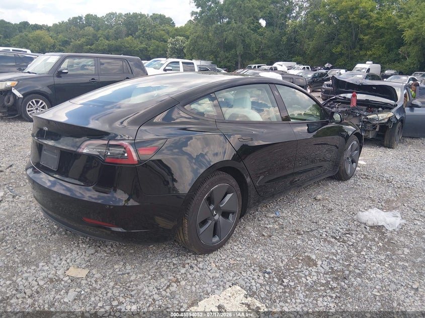 2021 Tesla Model 3 VIN 5YJ3E1EA8MF018758 IAAI salvage auction — LEFT FRONT, Salvage Title, sold $5,500 on 2026-07-31 (photo 4)