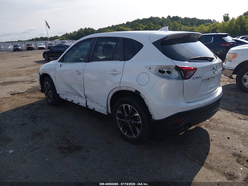 2016 Mazda Cx-5 VIN JM3KE2DY9G0771886 IAAI salvage auction — SIDE, Salvage Title, sold $3,250 on 2026-08-01 (photo 3)