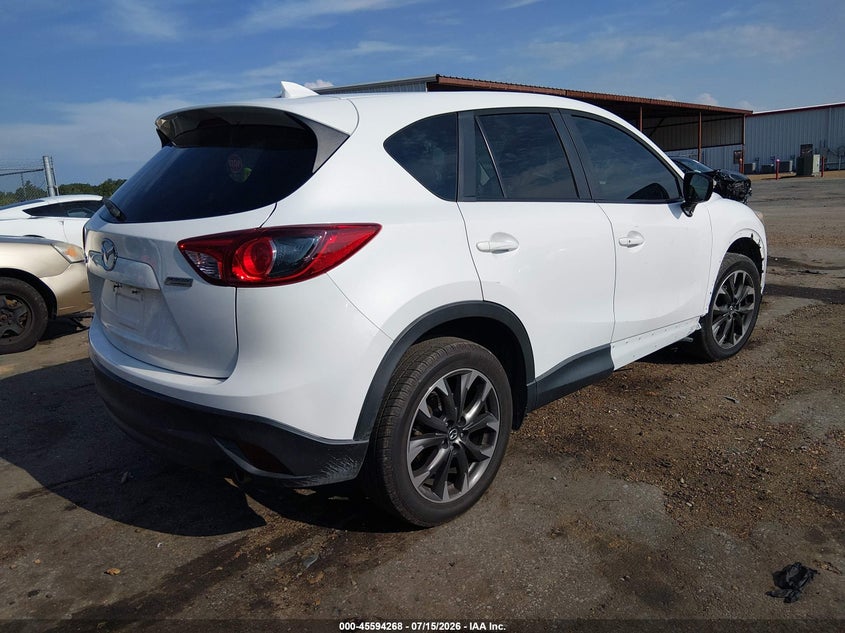 2016 Mazda Cx-5 VIN JM3KE2DY9G0771886 IAAI salvage auction — SIDE, Salvage Title, sold $3,250 on 2026-08-01 (photo 4)