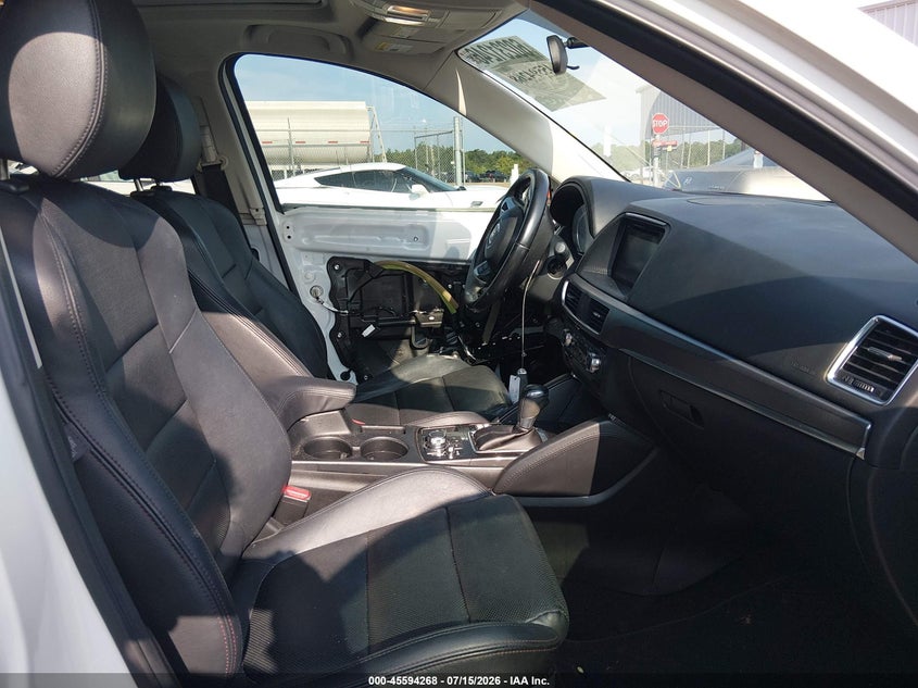 2016 Mazda Cx-5 VIN JM3KE2DY9G0771886 IAAI salvage auction — SIDE, Salvage Title, sold $3,250 on 2026-08-01 (photo 5)
