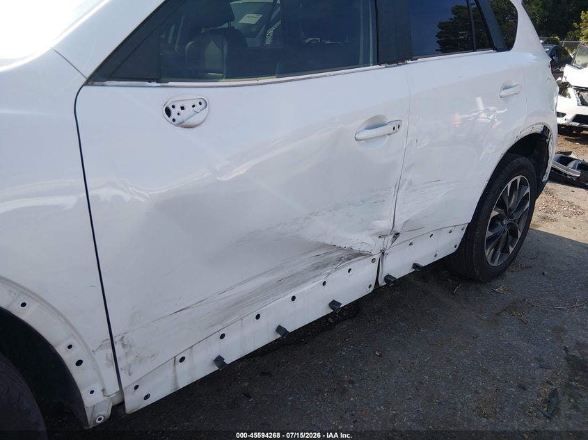 2016 Mazda Cx-5 VIN JM3KE2DY9G0771886 IAAI salvage auction — SIDE, Salvage Title, sold $3,250 on 2026-08-01 (photo 6)
