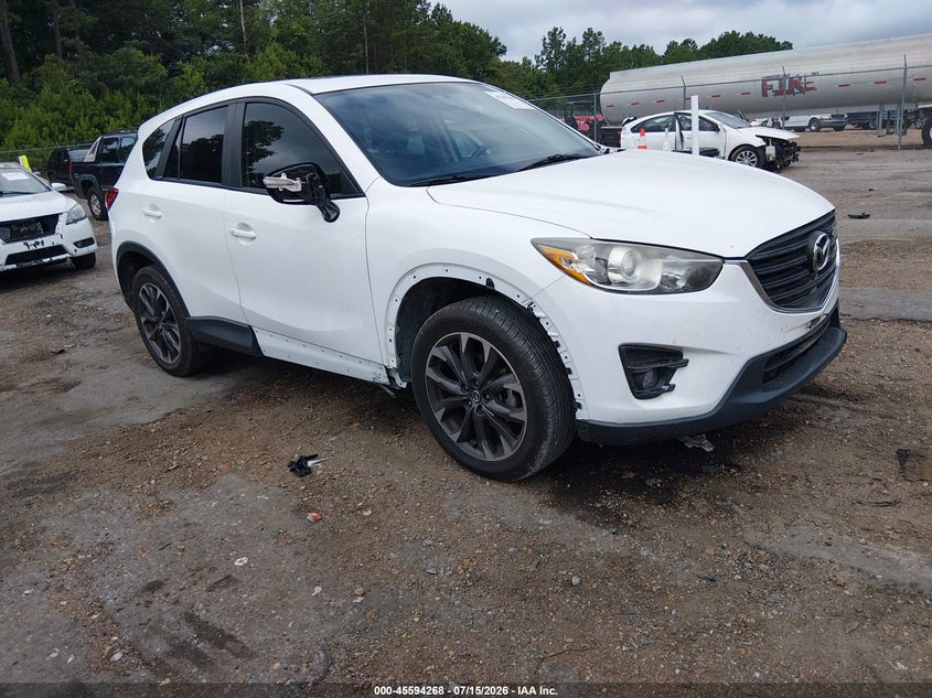 2016 Mazda Cx-5 VIN JM3KE2DY9G0771886 IAAI salvage auction — SIDE, Salvage Title, sold $3,250 on 2026-08-01 (photo 1)