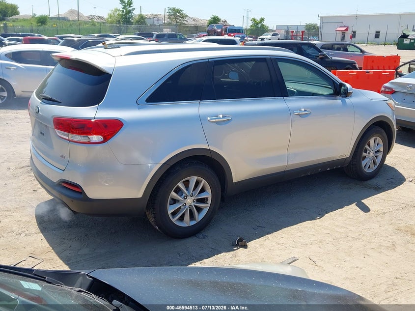 2016 Kia Sorento VIN 5XYPGDA32GG019714 IAAI salvage auction — NORMAL WEAR, Clear (Illinois), sold $275 on 2026-07-29 (photo 4)