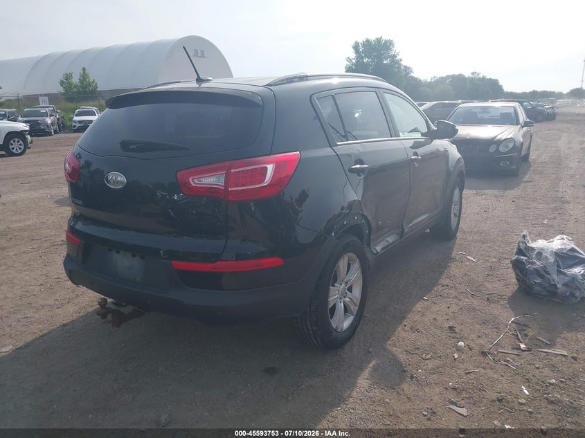 2012 Kia Sportage VIN KNDPBCA23C7234462 IAAI salvage auction — SIDE, Salvage (Iowa), sold $1,050 on 2026-07-29 (photo 4)