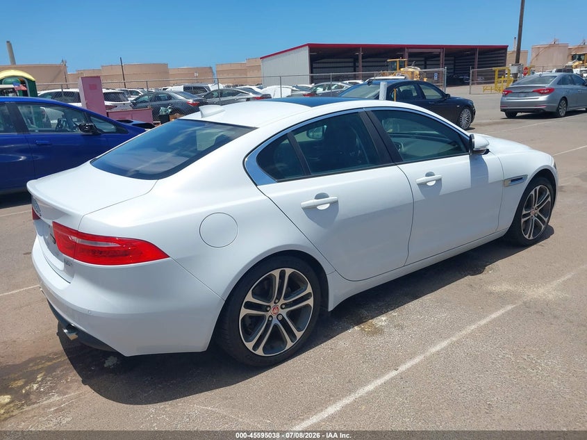 2017 Jaguar Xe VIN SAJAJ4BV0HA963750 IAAI salvage auction — NORMAL WEAR, Clear (Hawaii), sold $5,300 on 2026-07-14 (photo 4)