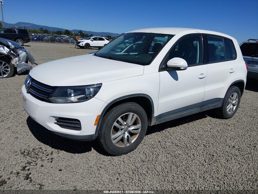 2013 Volkswagen Tiguan VIN WVGBV3AX3DW571455 IAAI salvage auction — NORMAL WEAR, Peddle Clear Public-Restricted (Oregon), sold $225 on 2026-07-29 (photo 2)
