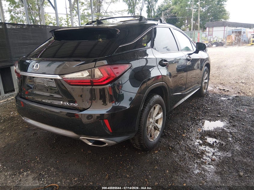2017 Lexus Rx VIN 2T2BZMCA0HC058312 IAAI salvage auction — UNKNOWN, Salvage Title, sold $12,100 on 2026-07-30 (photo 4)