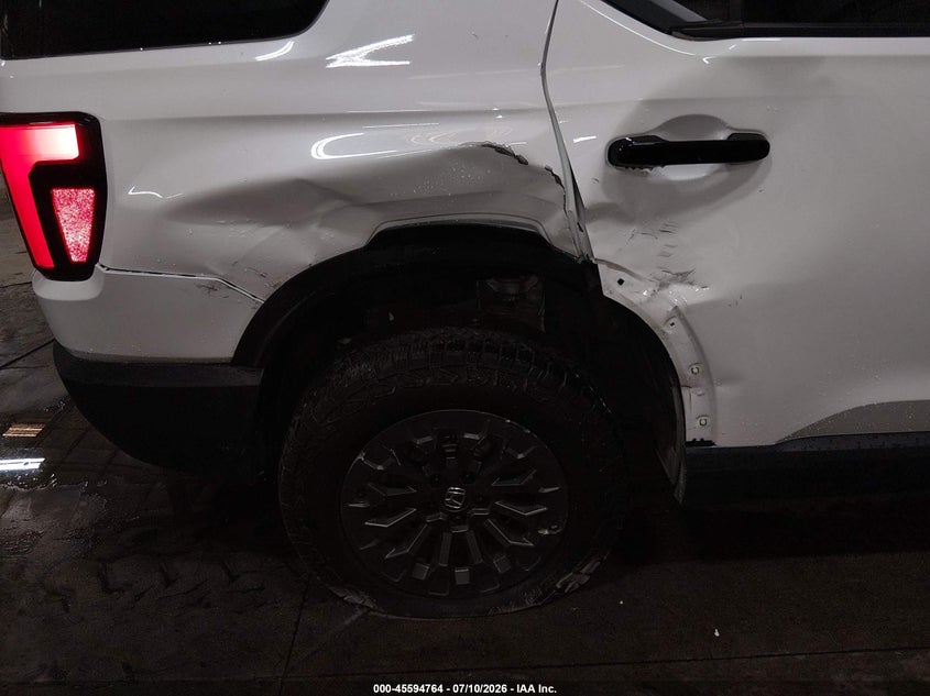 2026 Honda Passport VIN 5FNYF9H58TB014949 IAAI salvage auction — REAR END, Salvage (Idaho), sold $16,000 on 2026-07-31 (photo 6)