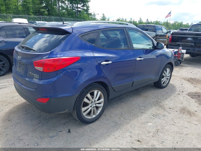 2010 Hyundai Tucson VIN KM8JU3AC1AU080904 IAAI salvage auction — NORMAL WEAR, Clear (Massachusetts), sold $1,050 on 2026-07-15 (photo 4)