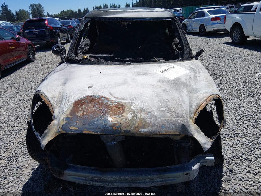 2013 Mini Paceman VIN WMWSS5C53DWN66645 IAAI salvage auction — ENGINE BURN, Salvage Title, sold $75 on 2026-08-19 (photo 6)