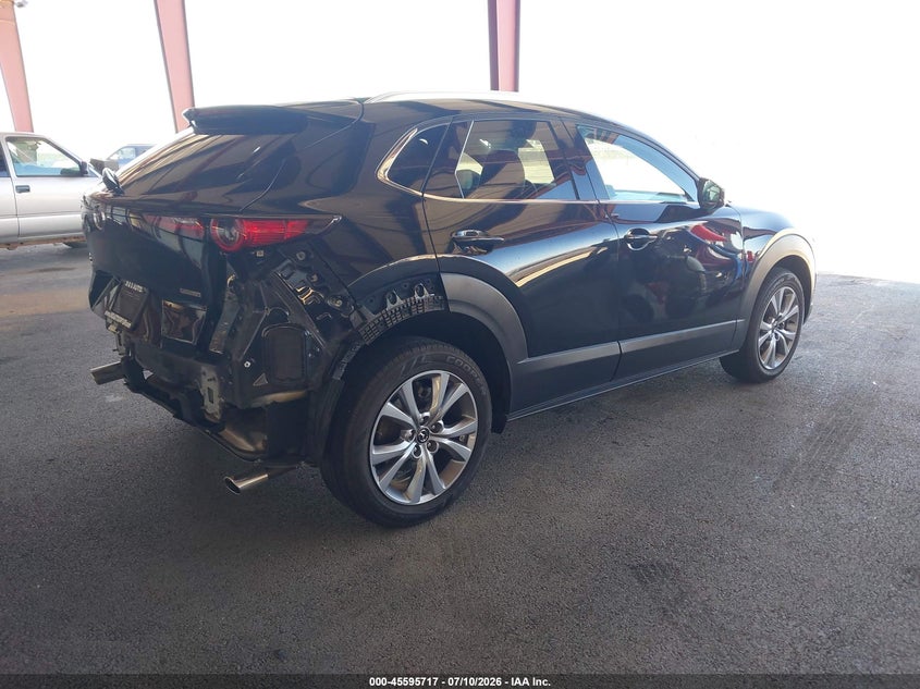 2023 Mazda Cx-30 VIN 3MVDMBDM0PM529386 IAAI salvage auction — REAR END, Wait Title, sold $8,200 on 2026-08-27 (photo 4)