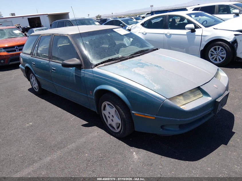 1994 Saturn Sw2 VIN 1G8ZK8578RZ320983 IAAI salvage auction — LEFT SIDE, Clear (Nevada), sold $100 on 2026-07-31 (photo 1)
