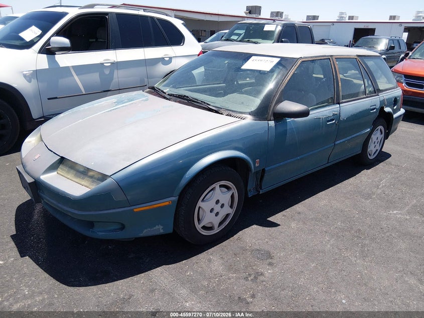 1994 Saturn Sw2 VIN 1G8ZK8578RZ320983 IAAI salvage auction — LEFT SIDE, Clear (Nevada), sold $100 on 2026-07-31 (photo 2)
