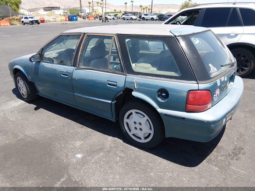 1994 Saturn Sw2 VIN 1G8ZK8578RZ320983 IAAI salvage auction — LEFT SIDE, Clear (Nevada), sold $100 on 2026-07-31 (photo 3)