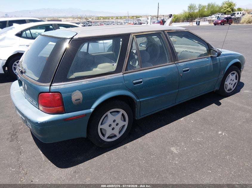 1994 Saturn Sw2 VIN 1G8ZK8578RZ320983 IAAI salvage auction — LEFT SIDE, Clear (Nevada), sold $100 on 2026-07-31 (photo 4)