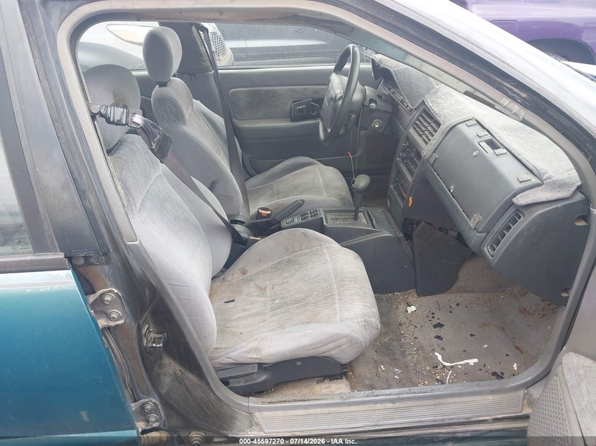 1994 Saturn Sw2 VIN 1G8ZK8578RZ320983 IAAI salvage auction — LEFT SIDE, Clear (Nevada), sold $100 on 2026-07-31 (photo 5)