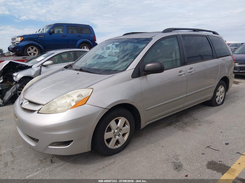 2009 Toyota Sienna VIN 5TDZK23C19S242437 IAAI salvage auction — NORMAL WEAR, Regular Certificate (Iowa), sold $525 on 2026-07-21 (photo 2)
