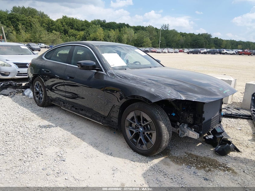 2024 BMW I4 VIN WBY83FB05RFS05543 — IAAI salvage auction photo