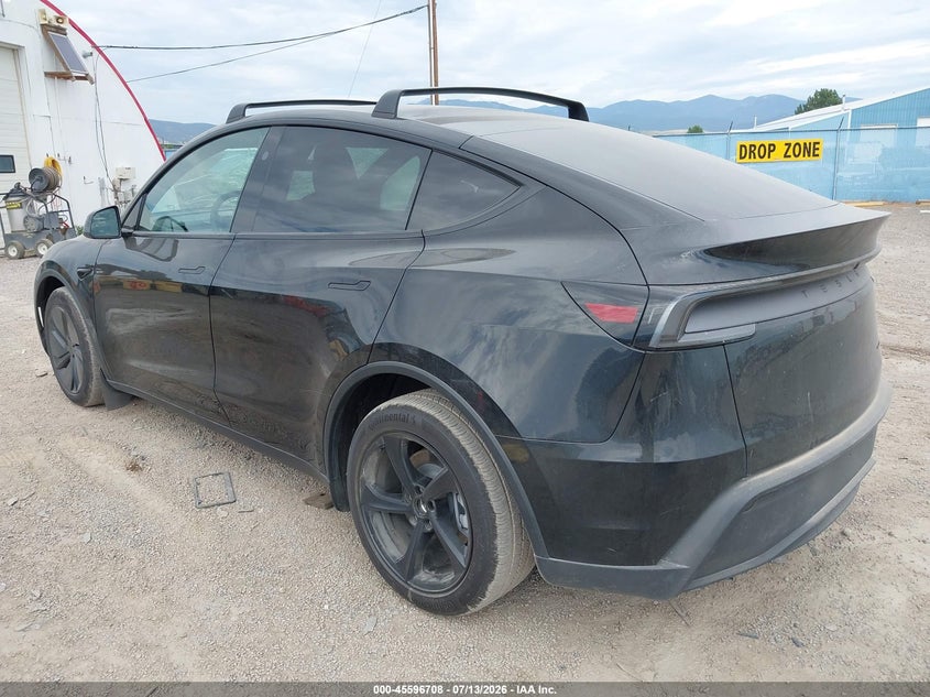 2026 Tesla Model y VIN 7SAYGDEE8TF628908 IAAI salvage auction — SIDE, Salvage Title, sold $29,500 on 2026-10-03 (photo 3)