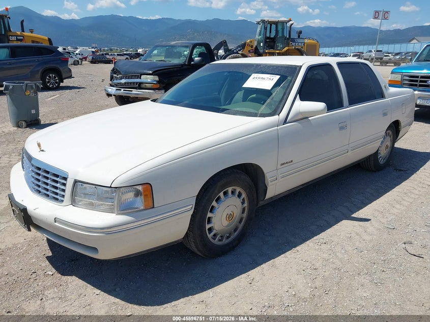 1999 Cadillac Deville VIN 1G6KD54Y6XU775807 IAAI salvage auction — NORMAL WEAR, Clear (Montana), sold $25 on 2026-07-22 (photo 2)