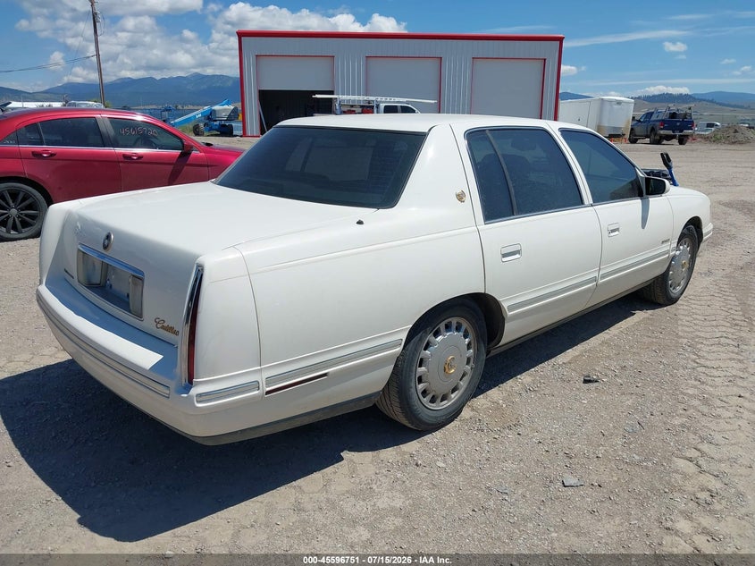 1999 Cadillac Deville VIN 1G6KD54Y6XU775807 IAAI salvage auction — NORMAL WEAR, Clear (Montana), sold $25 on 2026-07-22 (photo 4)