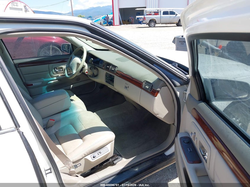 1999 Cadillac Deville VIN 1G6KD54Y6XU775807 IAAI salvage auction — NORMAL WEAR, Clear (Montana), sold $25 on 2026-07-22 (photo 5)